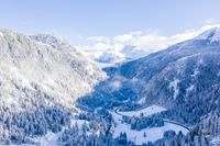 mesmerizing-shot-snow-covered-mountains-winter-blue-sky